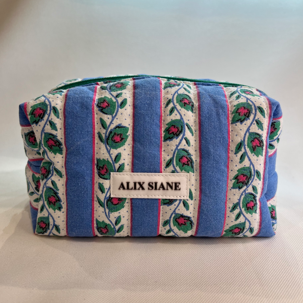 Trousse de toilette rayée et fleurie